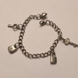 Silver Tone Charm Bracelet with Lock and Key Charms